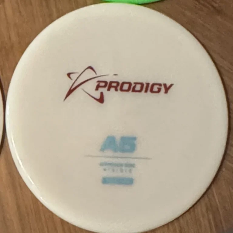 Prodigy A5 in 400 Glow plastic, blue stamp